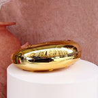 Sculptural Moon Face Clutch – Metallic Statement Evening Bag